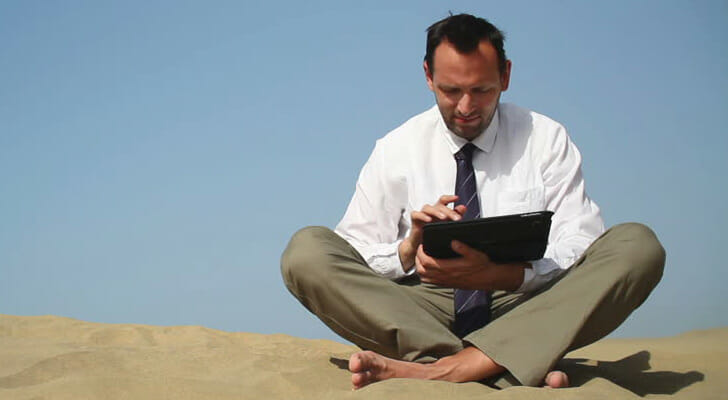 Employee Using a Tablet in a Remote Location