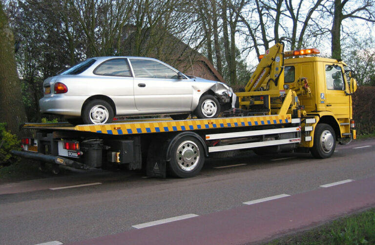 Car Being Towed by a Tow Truck